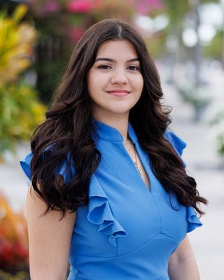 Portrait of Alyssa Lastre, Marketing Director.
