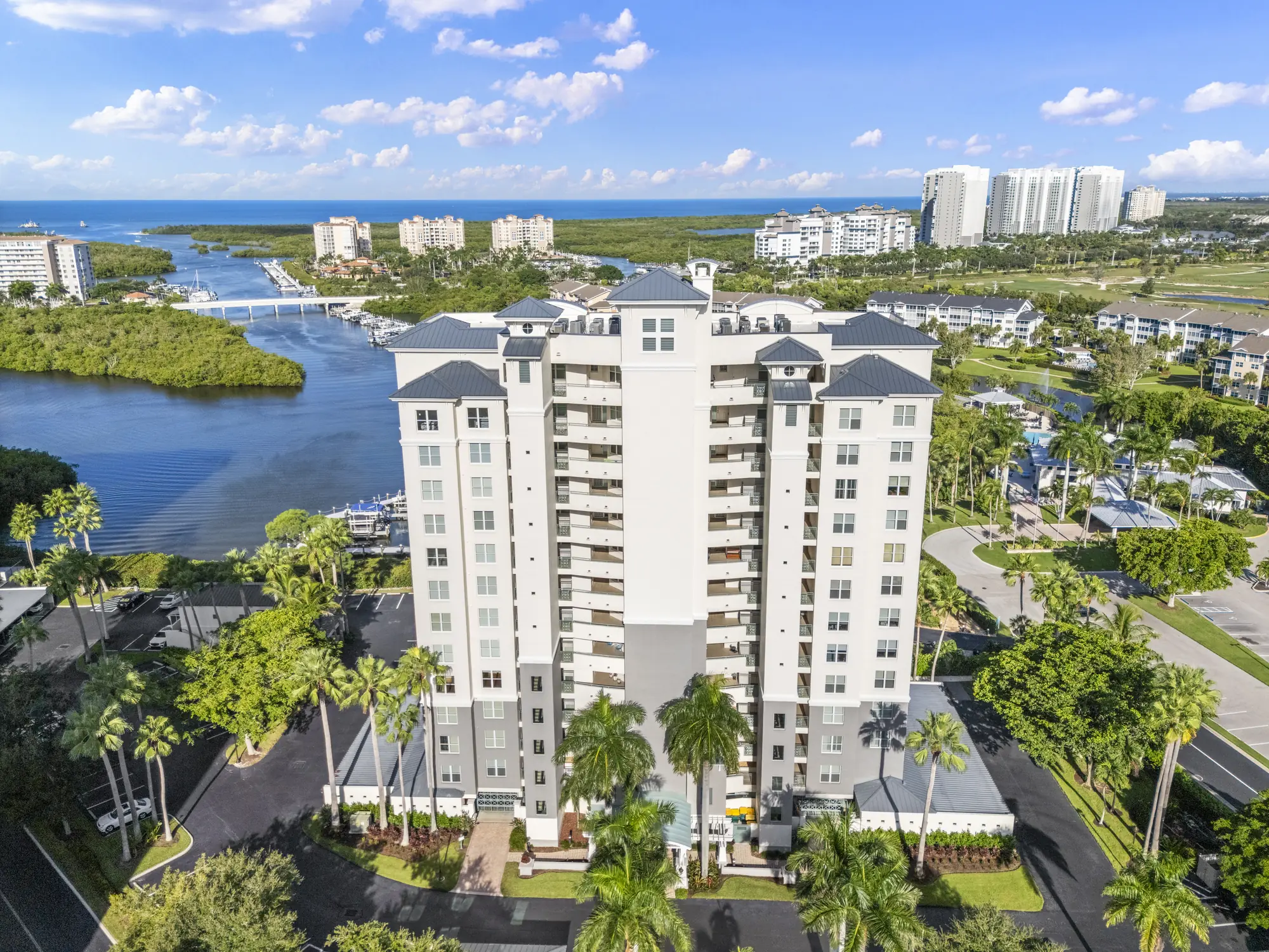 Aerial of Aruba at Cove Towers, 430 Cove Tower Drive, a high-rise on Wiggins Bay in North Naples, Florida