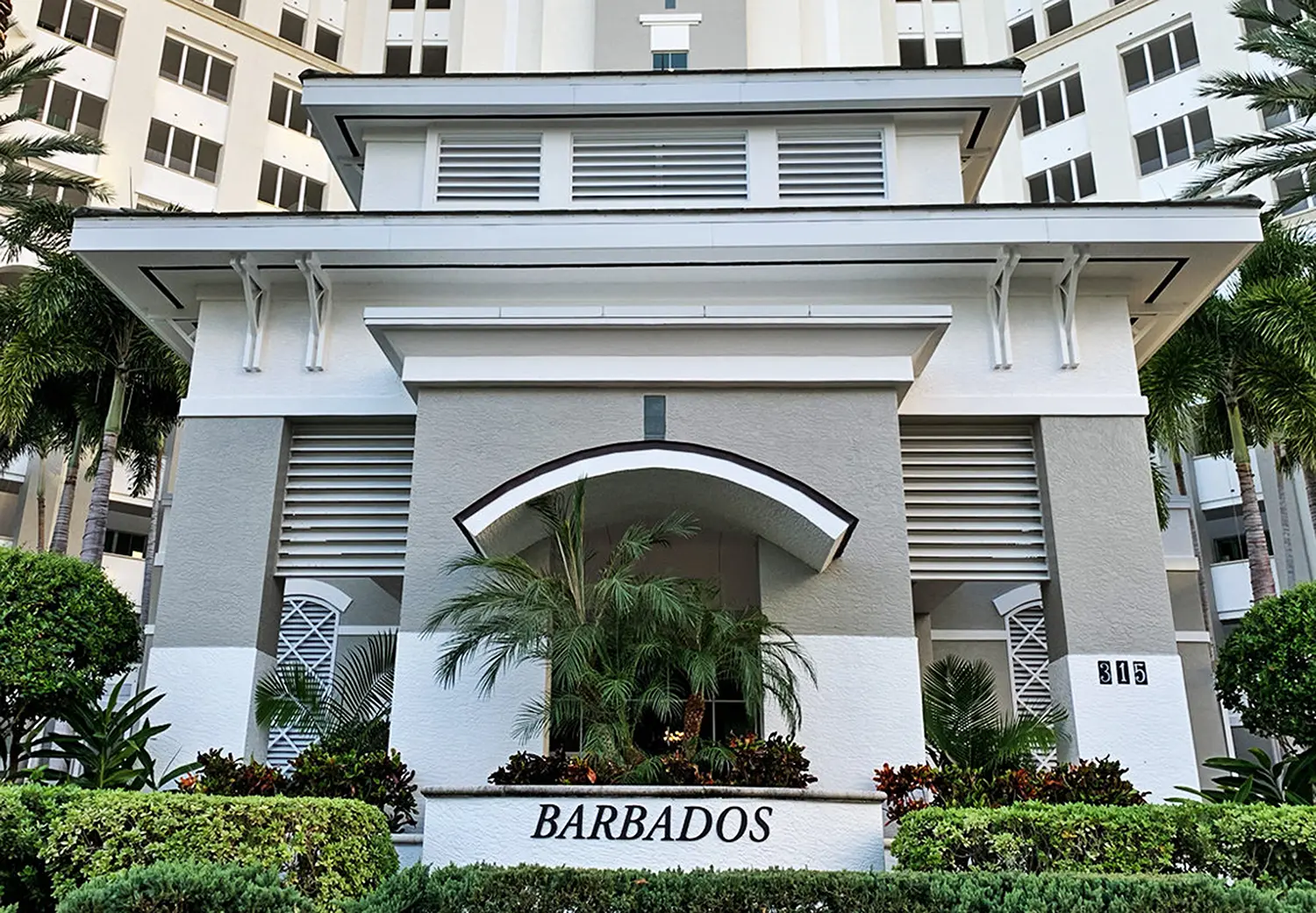 Barbados at The Dunes of Naples — porte-cochère entrance and signage at 315 Dunes Blvd, Naples, Florida