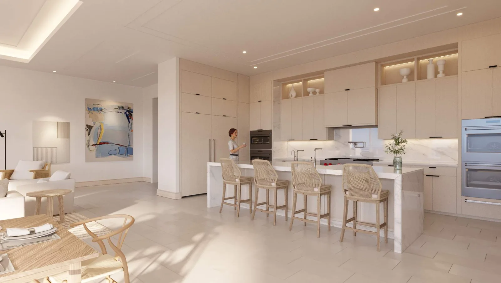 Kitchen of a Naples Beach Club residence in the Beachwood finish package, with flat-panel cabinetry, a marble backsplash, a waterfall-edge island and double wall ovens