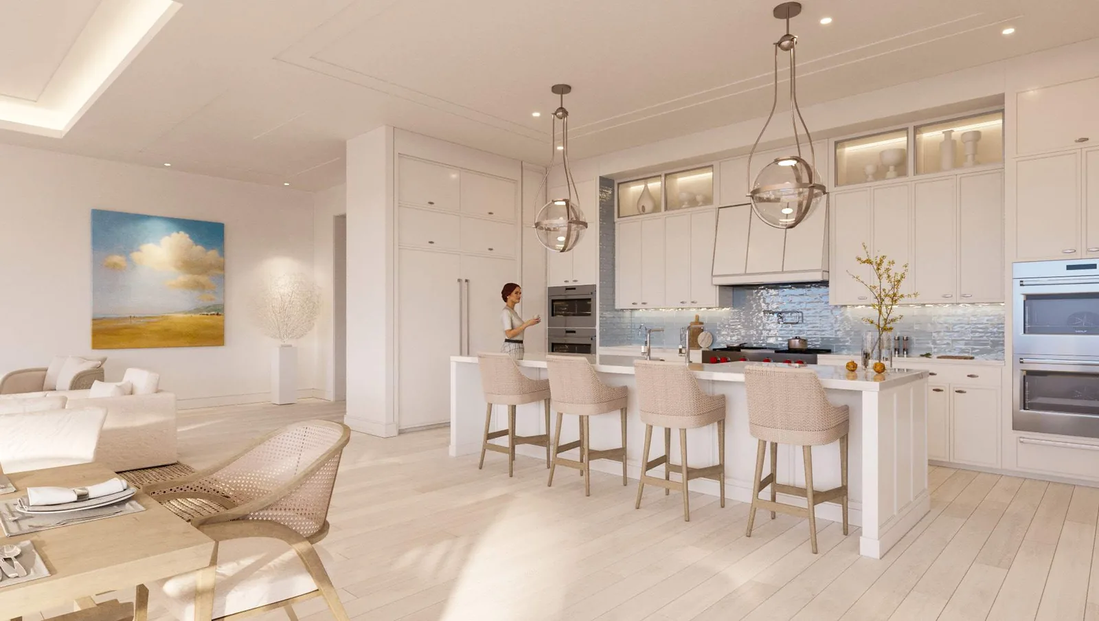 Kitchen of a Naples Beach Club residence in the Seashell finish package, with white painted cabinetry, a marble-topped island, a blue subway tile backsplash and Wolf wall ovens