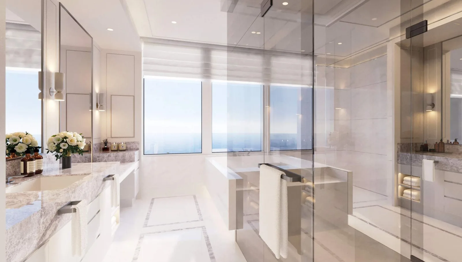 Primary bathroom of a Naples Beach Club residence in the Seashell finish package, with grey-veined marble counters, a glass-enclosed shower and a window over the Gulf
