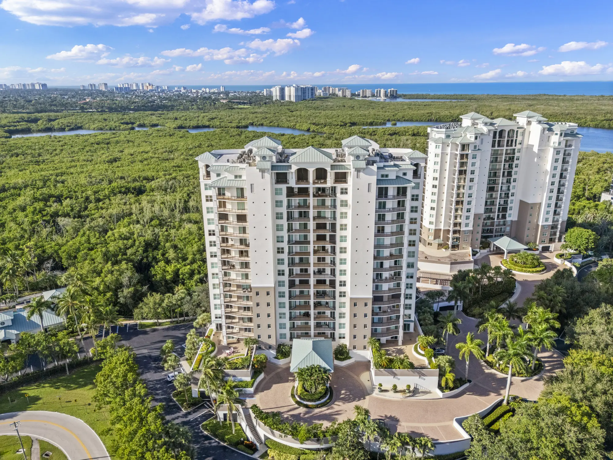 Aerial of Nevis at Cove Towers, 455 Cove Tower Drive, a high-rise above the mangrove preserve in North Naples, Florida
