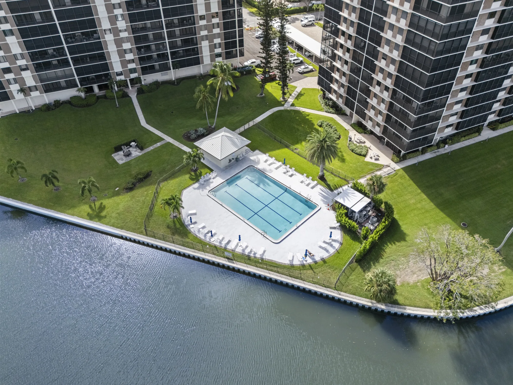 Aerial of the Vanderbilt Surf Colony heated lap pool on the bay between the towers at 15 and 17 Bluebill Avenue, Vanderbilt Beach, Naples, Florida