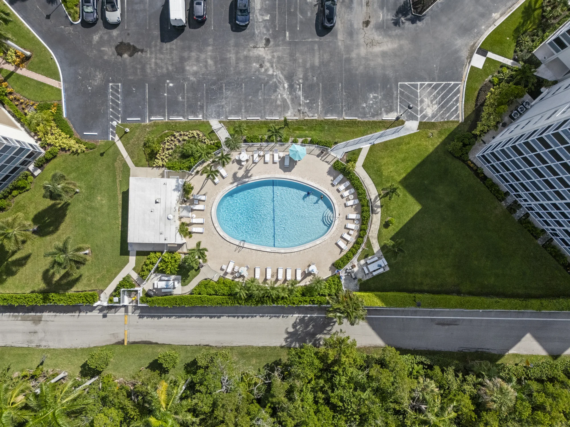 Aerial of the pool shared by the Vanderbilt Towers buildings at 1 and 3 Bluebill Avenue, Vanderbilt Beach, Naples, Florida